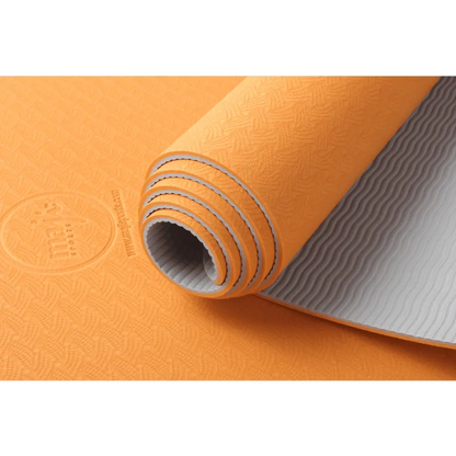 Orange and gray textured TPE Premium Yoga Mat for better grip and comfort during workouts