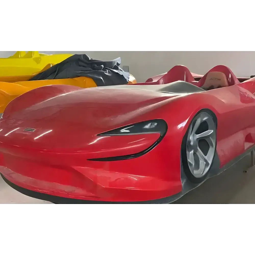 Red open-top sports car in Race Car Floating Jet Car Bed with fiberglass floating jet design