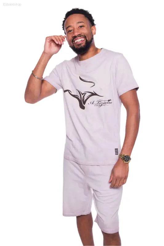 Man in matching lavender t-shirt and shorts.
