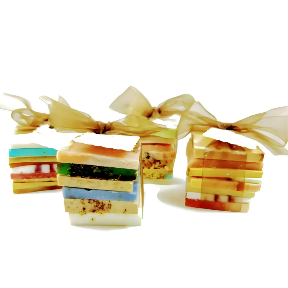 Vibrant Rainbow Vegan Soap Sampler with colorful stacked bars and cute ribbons