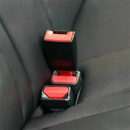 Stacked black seatbelt buckles with red release buttons from the Red & Black Seatbelt Buckle Extension