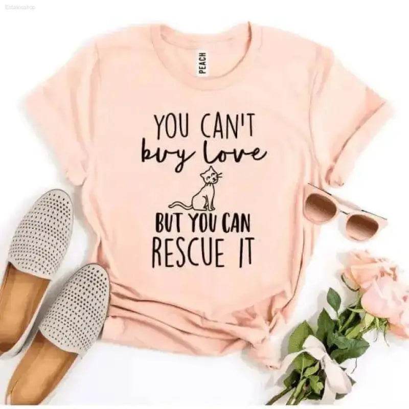 Peach-colored t-shirt with cat rescue message.