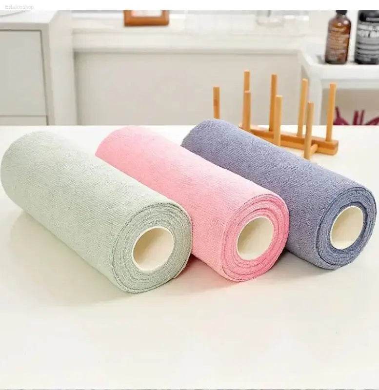 Three rolls of colorful microfiber towels.