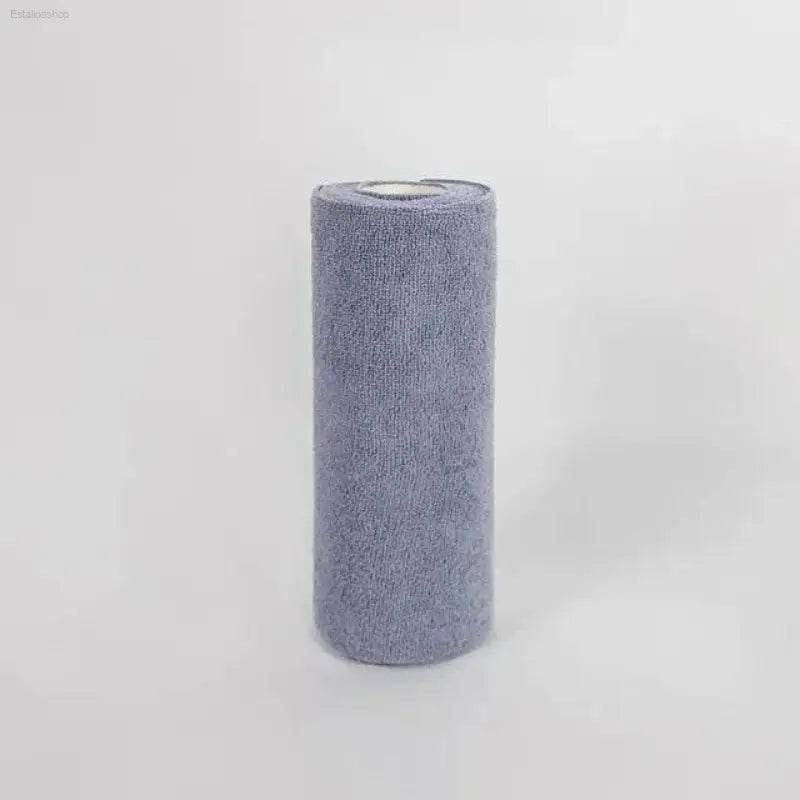 Gray rolled-up towel.
