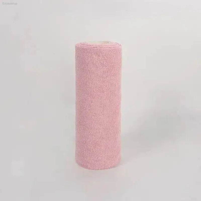 Pink rolled towel.