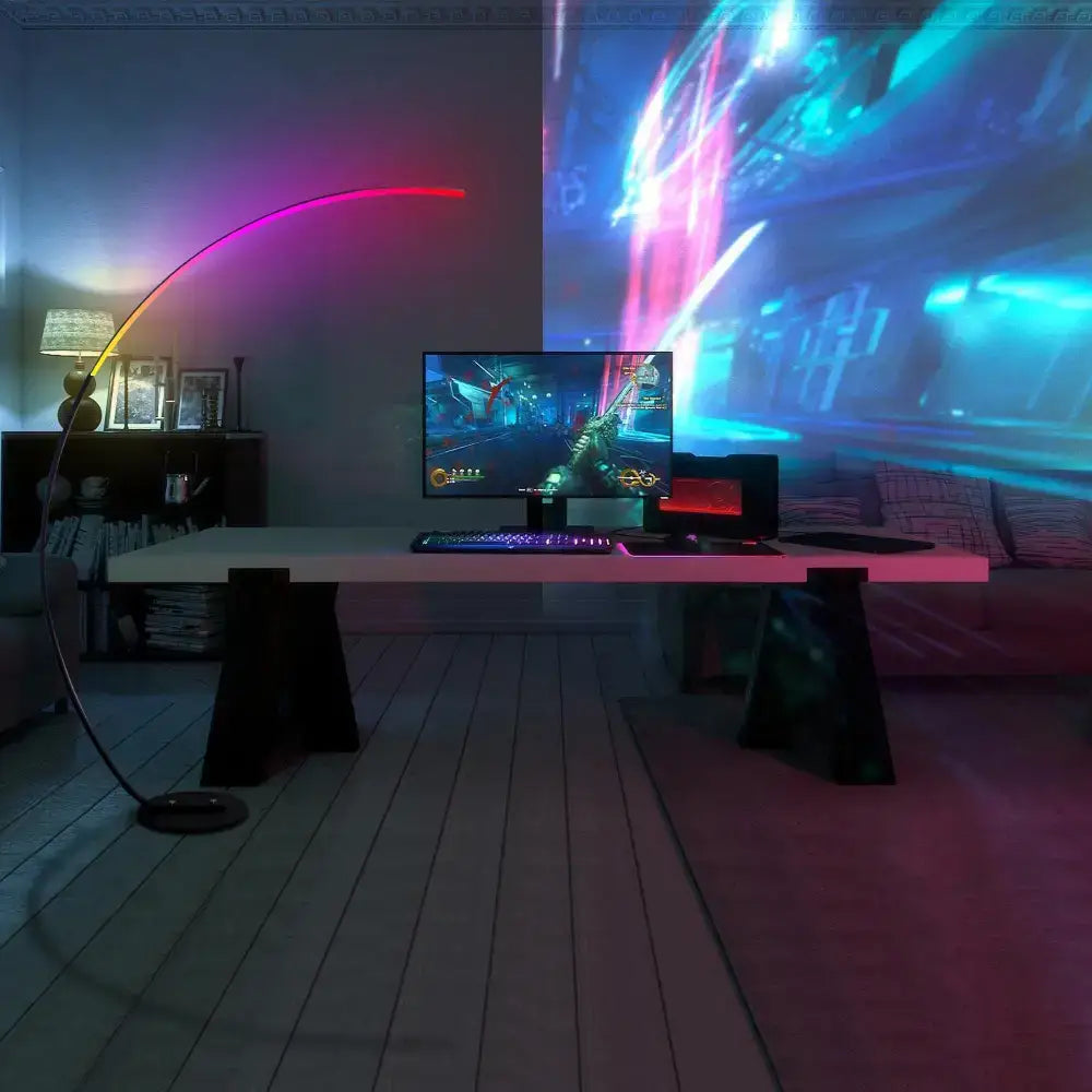 Gaming setup featuring RGBW Modern Curve Floor Lamp with vibrant colorful lighting