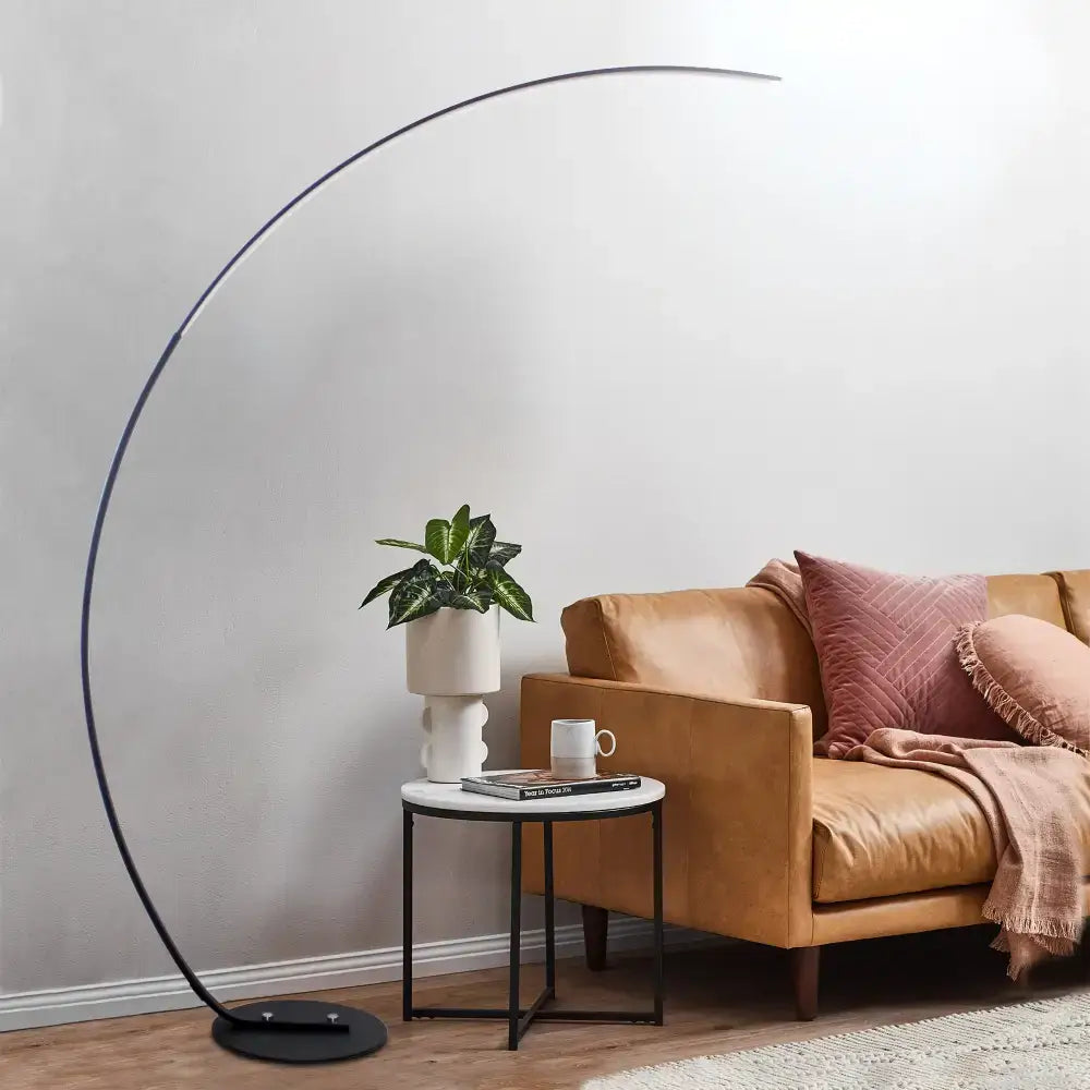 Stylish RGBW Modern Curve Floor Lamp adding elegance to any room with its sleek design