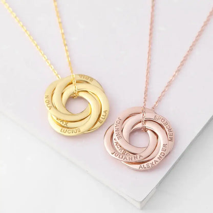 Gold and rose gold interlocking name necklaces for a personalized grandma gift