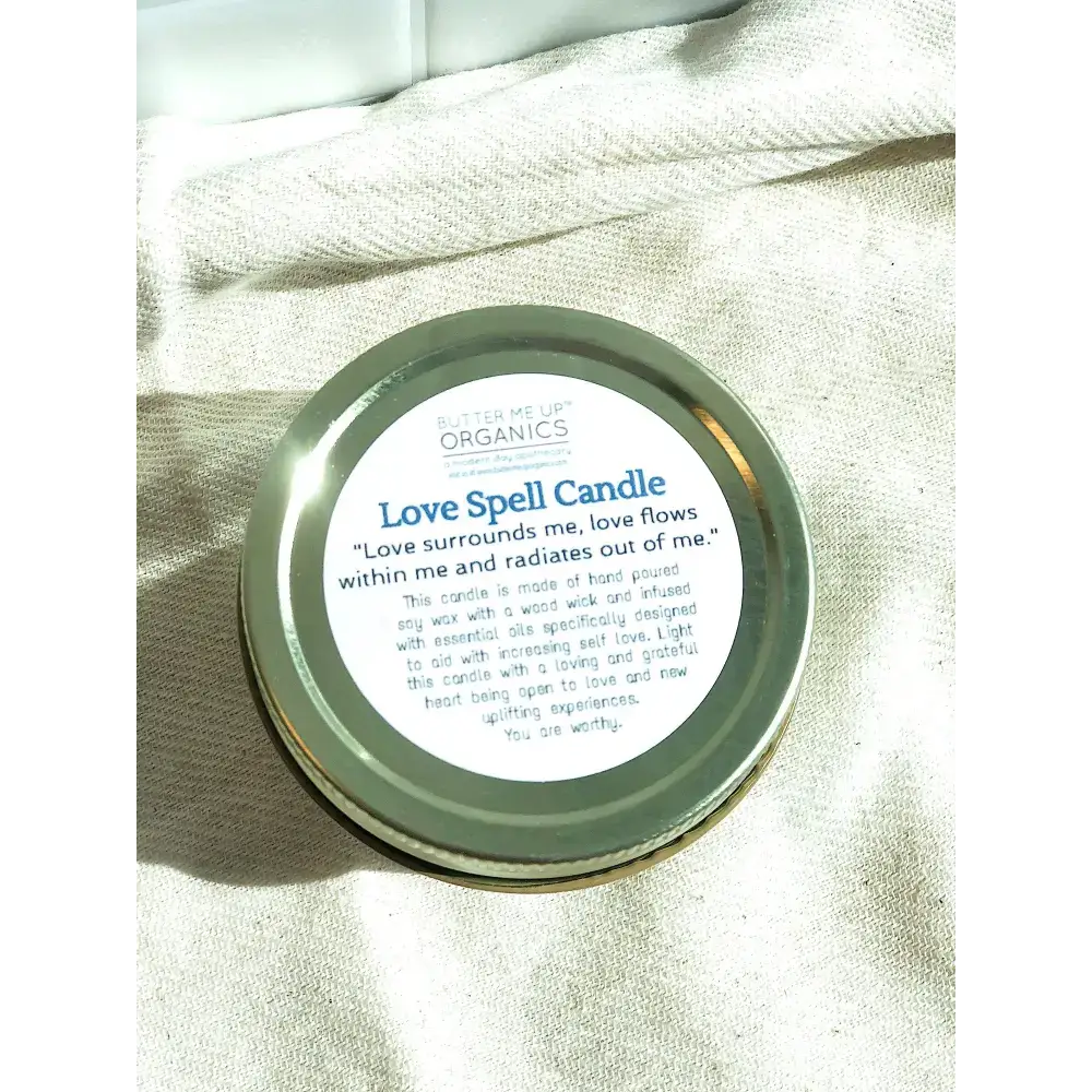 Love Spell Candle in a metal tin from the Rose Petal Love Spell Ritual Kit