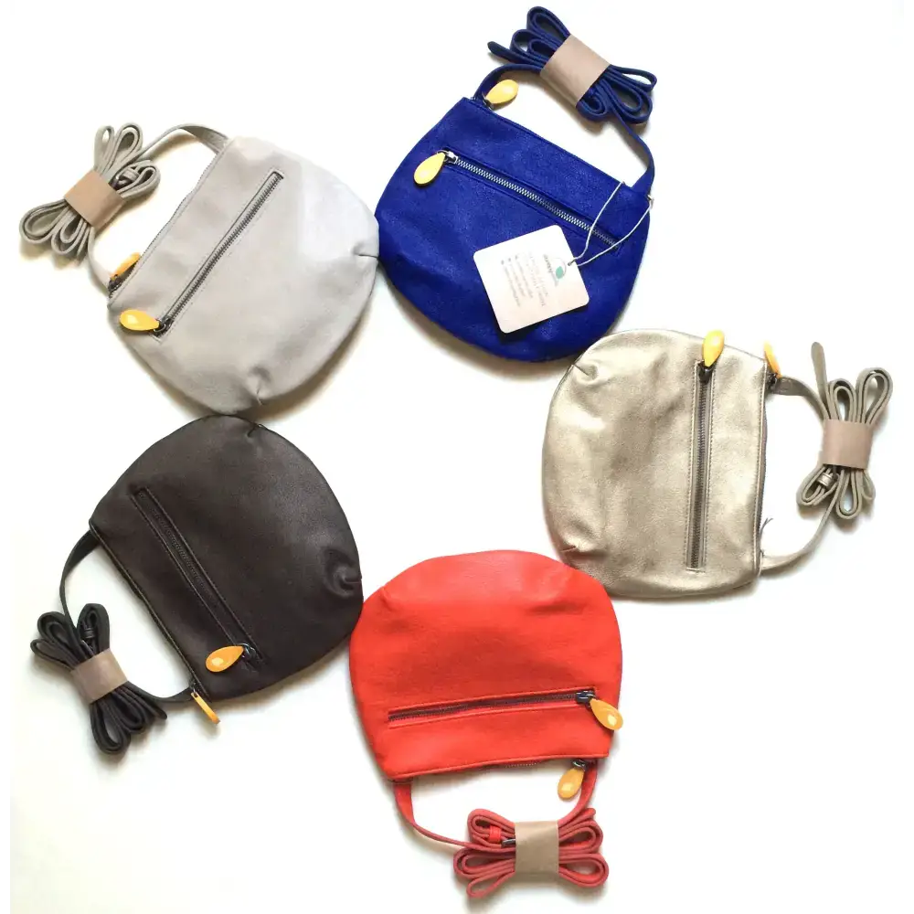 Colorful leather crossbody bags including the Royal Blue Willoughby Crossbody Bag