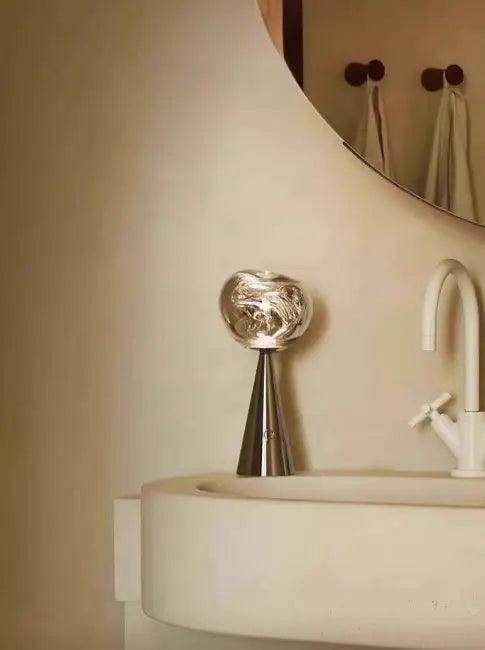Stylish Copper Glow Table Lamp with Sculptural Flair - Estalios
