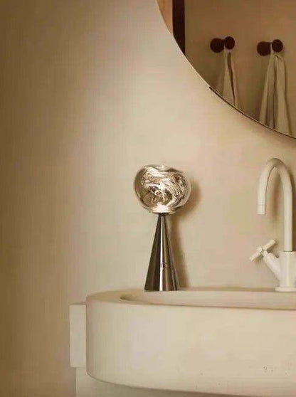 Stylish Copper Glow Table Lamp with Sculptural Flair - Estalios