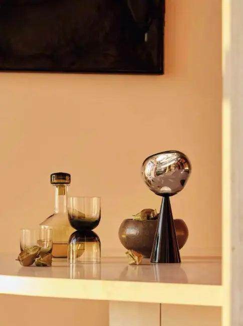 Stylish Copper Glow Table Lamp with Sculptural Flair - Estalios