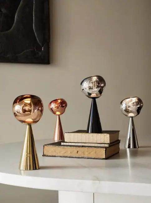Stylish Copper Glow Table Lamp with Sculptural Flair - Estalios