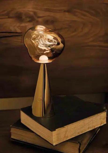 Stylish Copper Glow Table Lamp with Sculptural Flair - Estalios