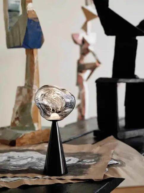 Stylish Copper Glow Table Lamp with Sculptural Flair - Estalios
