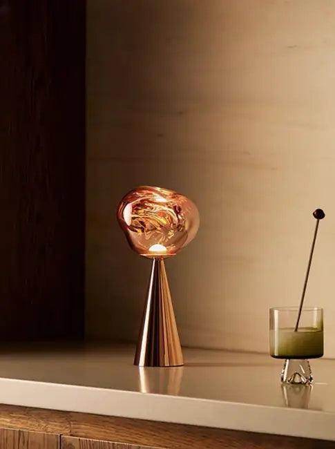 Stylish Copper Glow Table Lamp with Sculptural Flair - Estalios