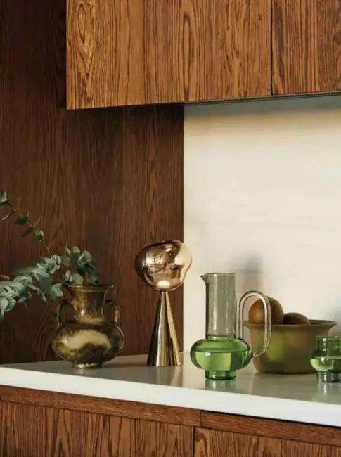 Stylish Copper Glow Table Lamp with Sculptural Flair - Estalios