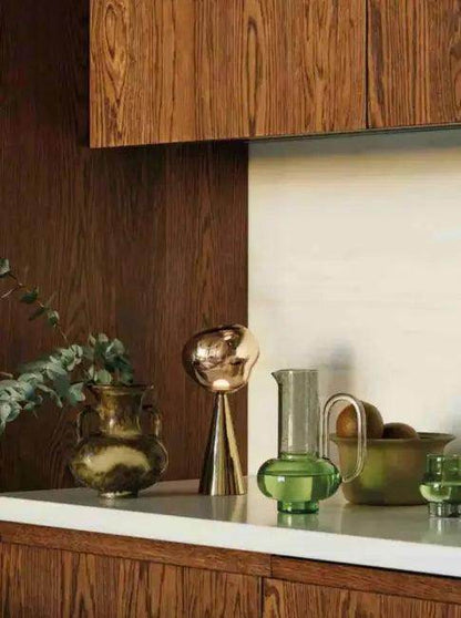 Stylish Copper Glow Table Lamp with Sculptural Flair - Estalios