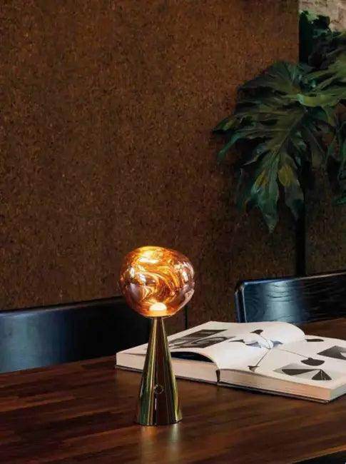 Stylish Copper Glow Table Lamp with Sculptural Flair - Estalios