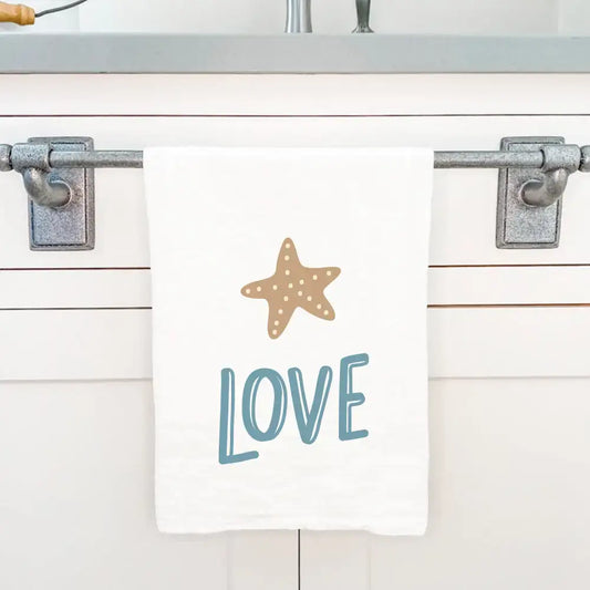 White cotton tea towel with sea star love design and starfish accents