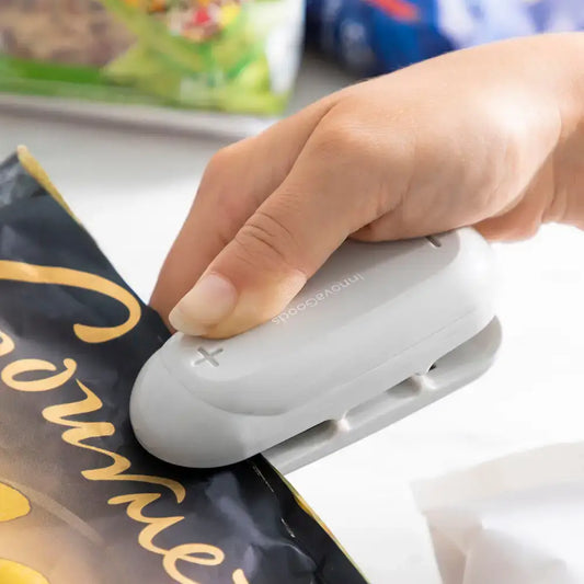 Gray plastic bag sealer from Innovagoods, perfect for keeping food fresh with Baseyl