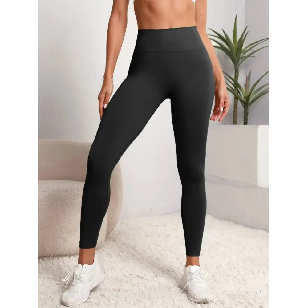 High-waisted black Seamless Hip Lifting Leggings for Women, perfect for gym or casual wear