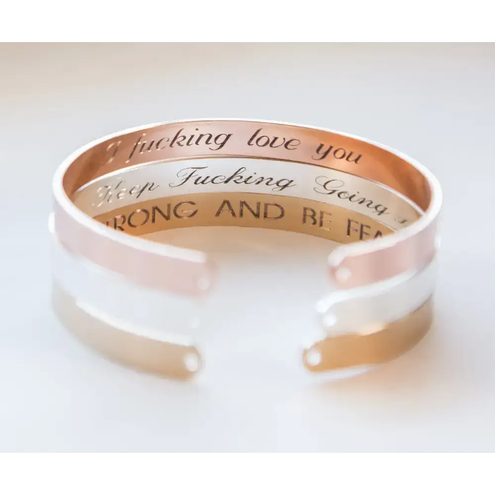 Stack of Secret Message Engraved Cuff Bracelets, perfect personalized engraved gift