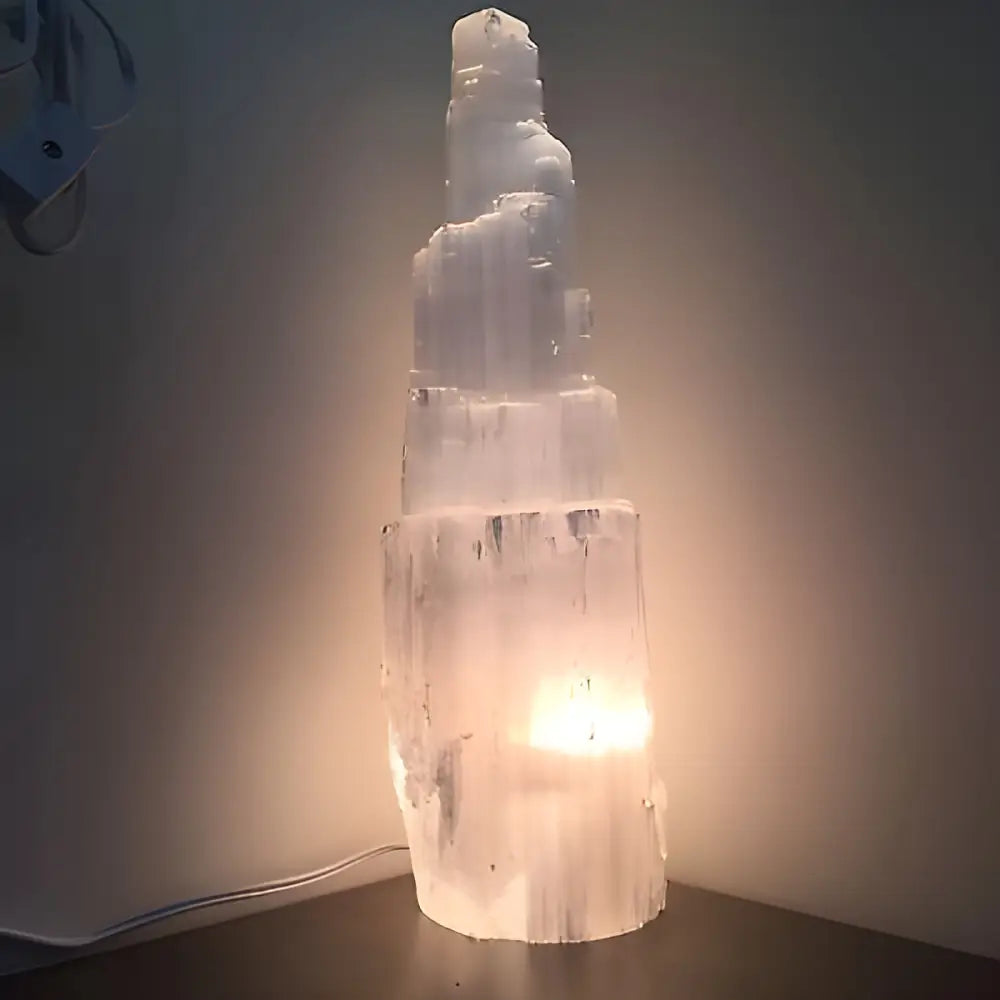 Illuminated Selenite Crystal Skyscraper Lamp Prime adding a serene glow to any space