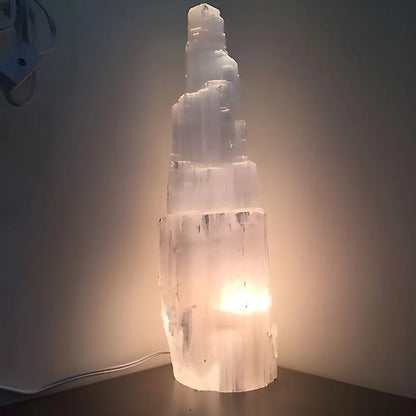 Illuminated Selenite Crystal Skyscraper Lamp Prime adding a serene glow to any space