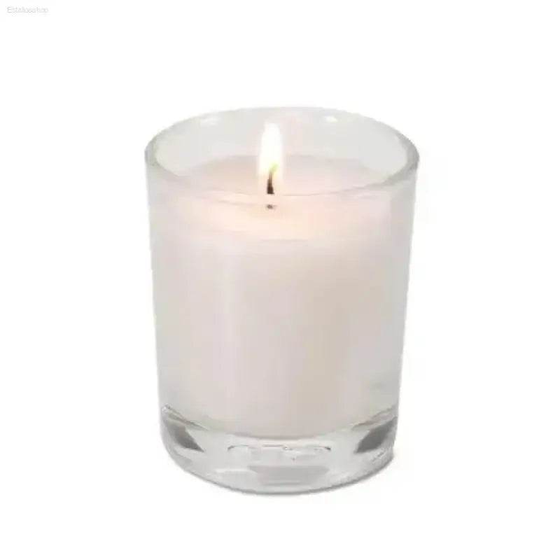 Senses Glass Candle Ablaze: Ignite your Night Experience Tranquility with our Lit White Candle in Glass Holder. this Elegant Piece Enhances any Space, Offering - Estalios