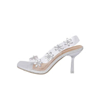 Shimmering Bloom: Chic Silver Sandals with Floral Embellishments - Estalios
