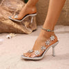 Shimmering Bloom: Chic Silver Sandals with Floral Embellishments - Estalios