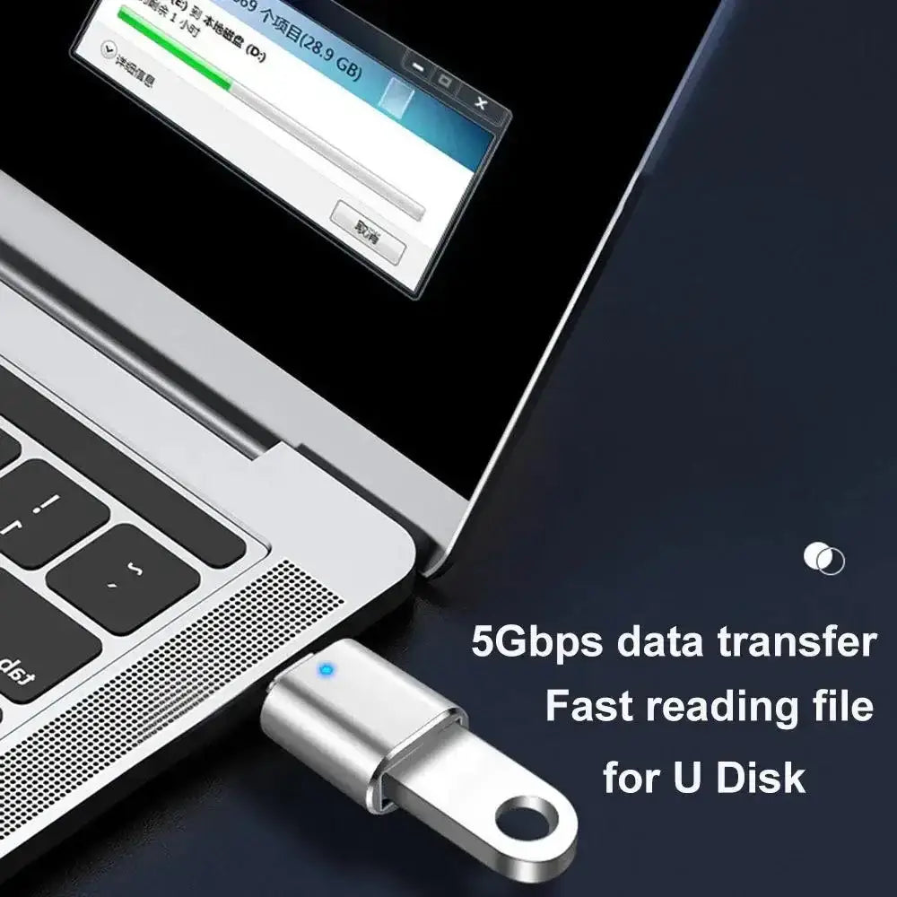 Silver USB Type C Adapter in use showcasing fast transmission speed with a laptop