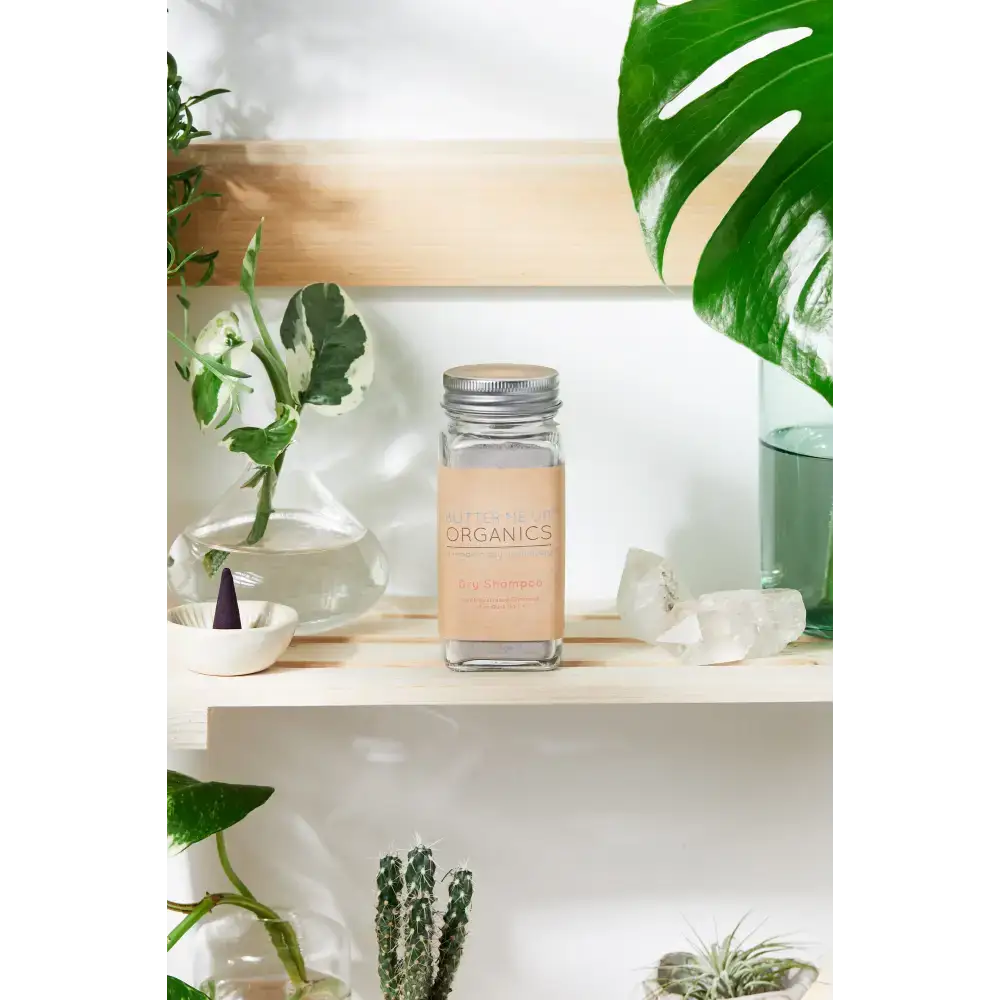 Square glass jar with a metal lid for storing natural organic dry shampoo