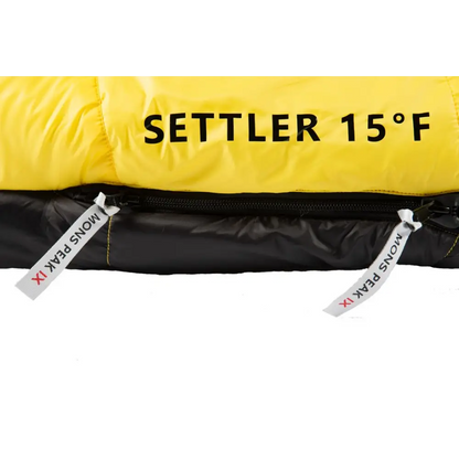 Yellow and black sleeping bag with zipper pulls, perfect for camping adventures