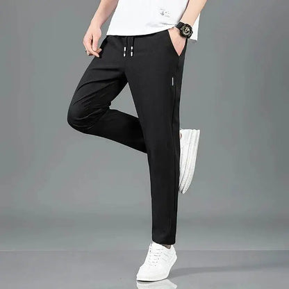 Black drawstring athletic pants for a comfy summer waist vibe, perfect for business casual