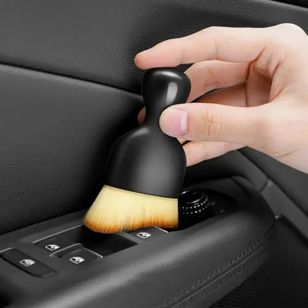 Black-handled detailing brush from Soft Brush Trio for easy car interior dust sweeping