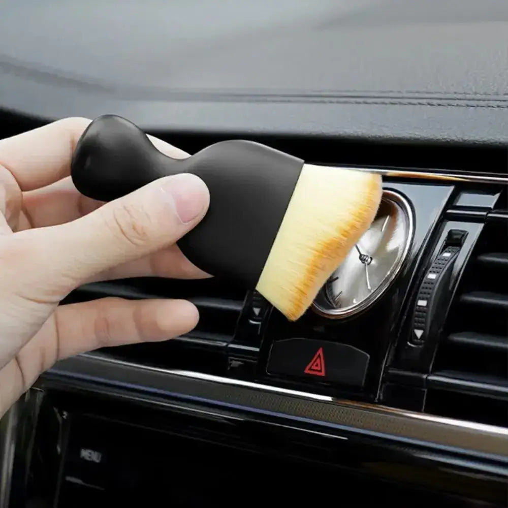 Black handled cleaning brush from Soft Brush Trio for easy car interior dust sweeping