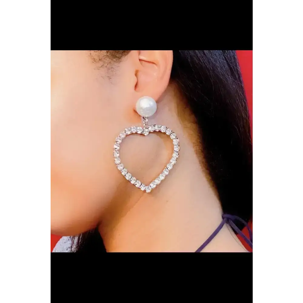 Heart-shaped crystal earrings with pearl studs, perfect for your heart’s desire fashion look