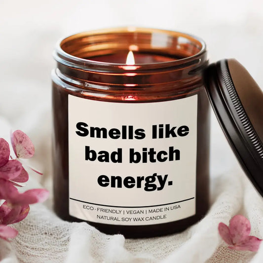 Lit Spiced Pumpkin Ginger Bad Bitch Energy Candle in a chic brown jar