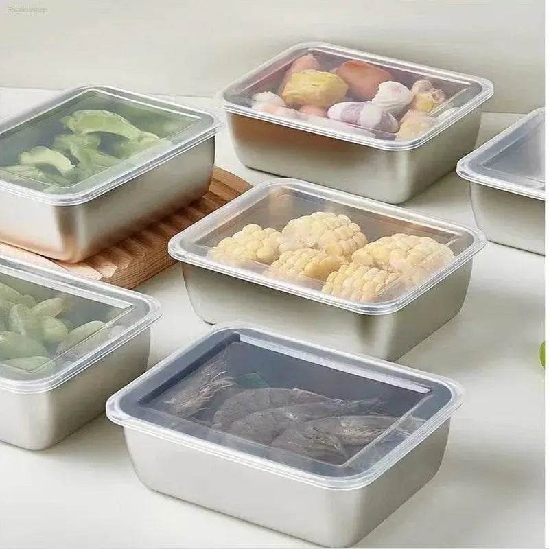 Stainless steel food containers with clear lids.