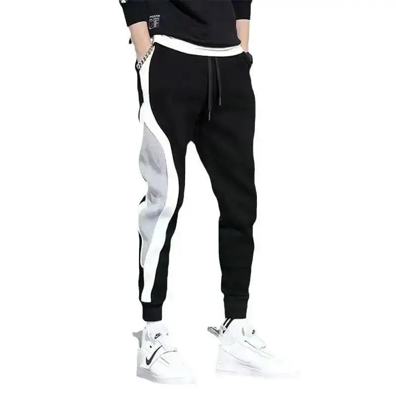 Black and gray athletic pants from Stylish Gray Mens Casual Pants With Patchwork collection