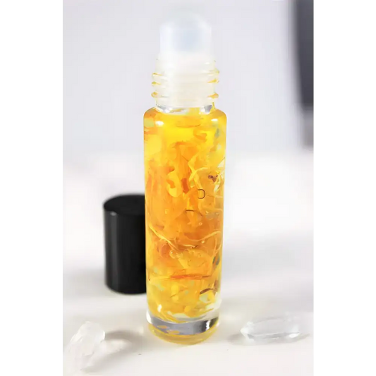 Rollerball bottle of Sunny Flower Petal Perfume Oil with yellow organic essential oil