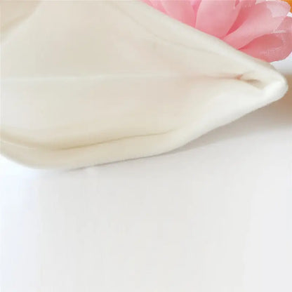 Cream-colored soft pillow from Sweet Baby Girl Newborn Hat & Pillow Set on hot sale