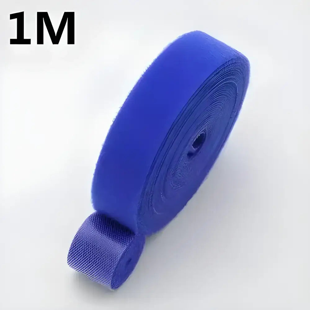 Blue hook and loop fastener roll for Tame Cable Chaos wire management with Winder Tape