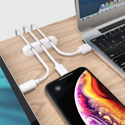 Nnbili Silicone USB Cable Winder keeping cords tidy with connected devices on a desk