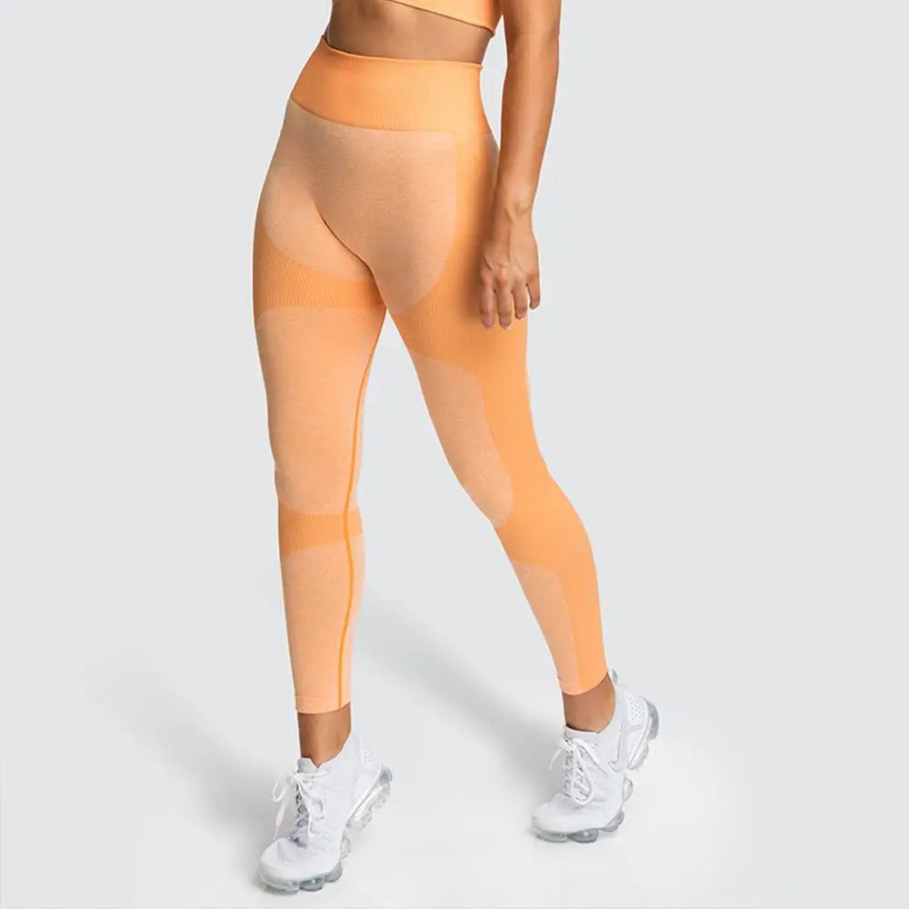 Textured High Waist Athletic Seamless Yoga Leggings in vibrant orange for stylish workouts