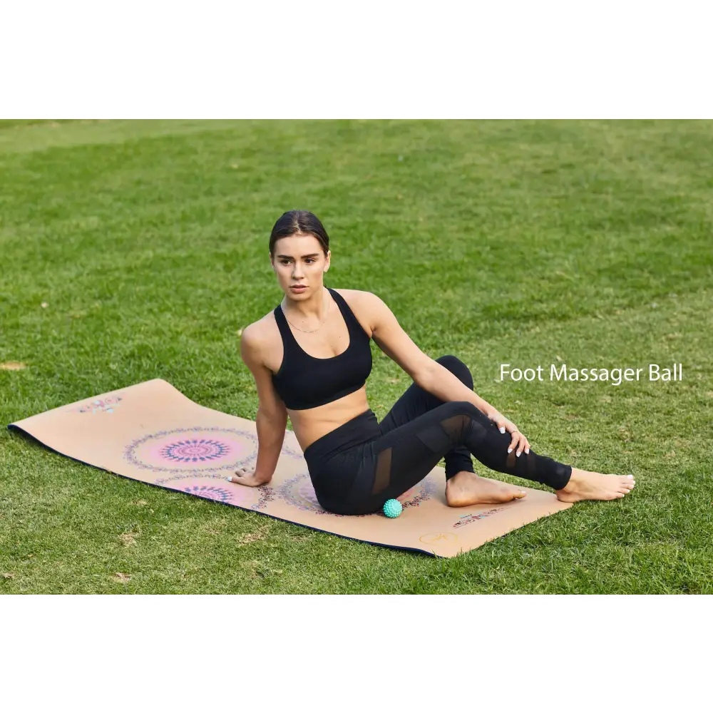 Woman using a massage ball from the Travel Muscle Massage Bundle for relaxation