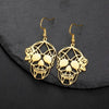 Trendy Skeleton Head Dangle Earrings for Halloween Fun - Estalios